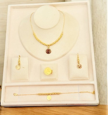 طقم طابات ليرة(سنسال واسواره وخاتم وحلق)